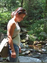 Kim Shearer over a stream